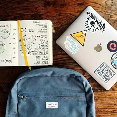 laptop, notebook, and backpack